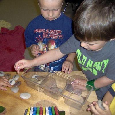 two children playing with blocks